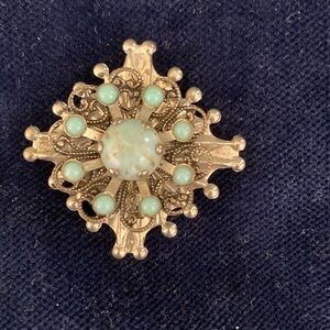 Faux Turquoise and silver toned metal brooch/pendant